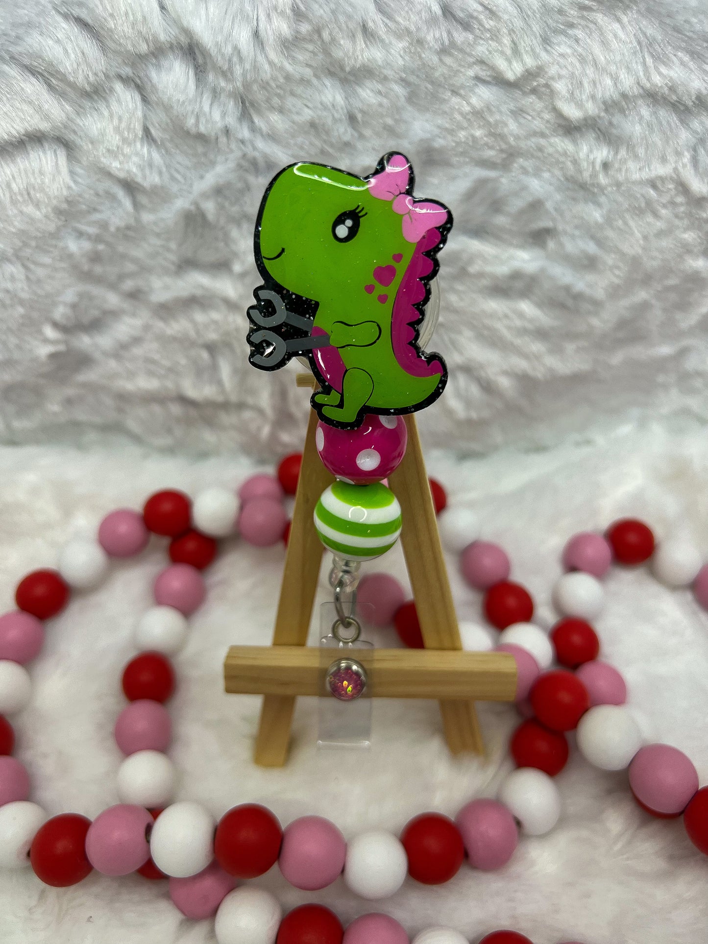 Dinosaur with Arm Extenders Badge Reel