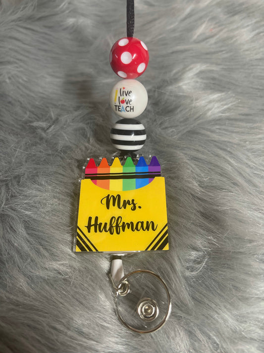 Teacher ID badge on breakaway lanyard